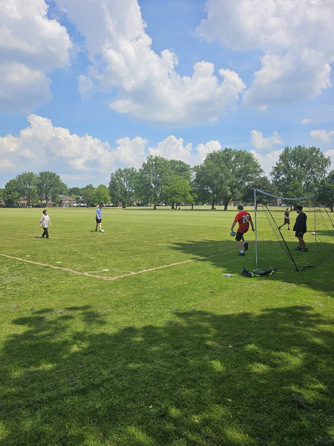 Learners taking part in an outdoor football activity.